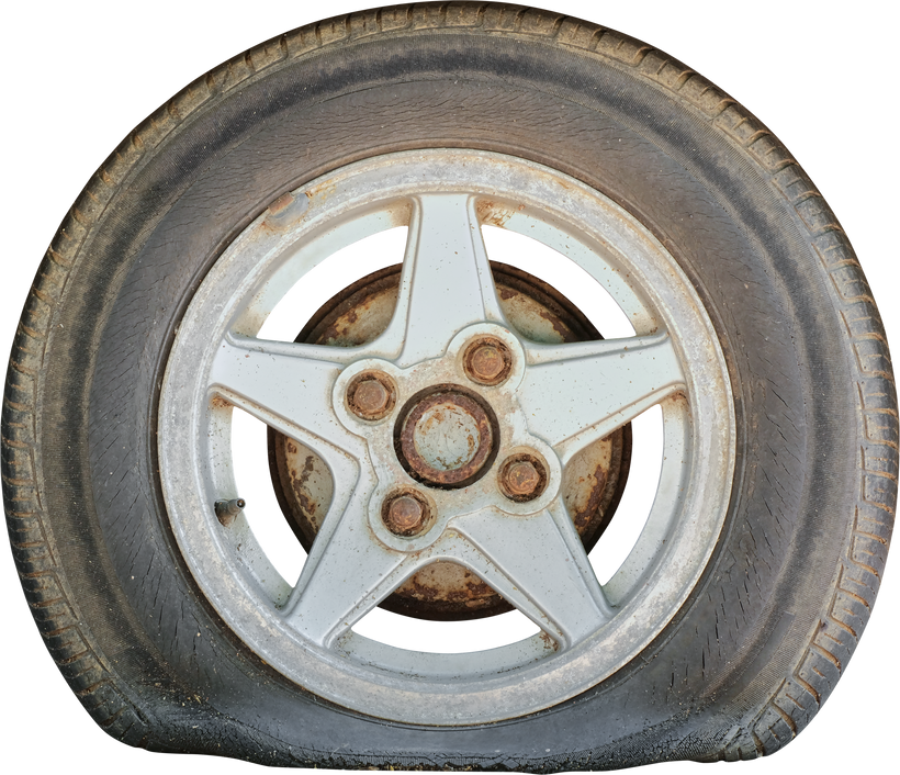 Flat Tire with Rusty Alloy Wheel